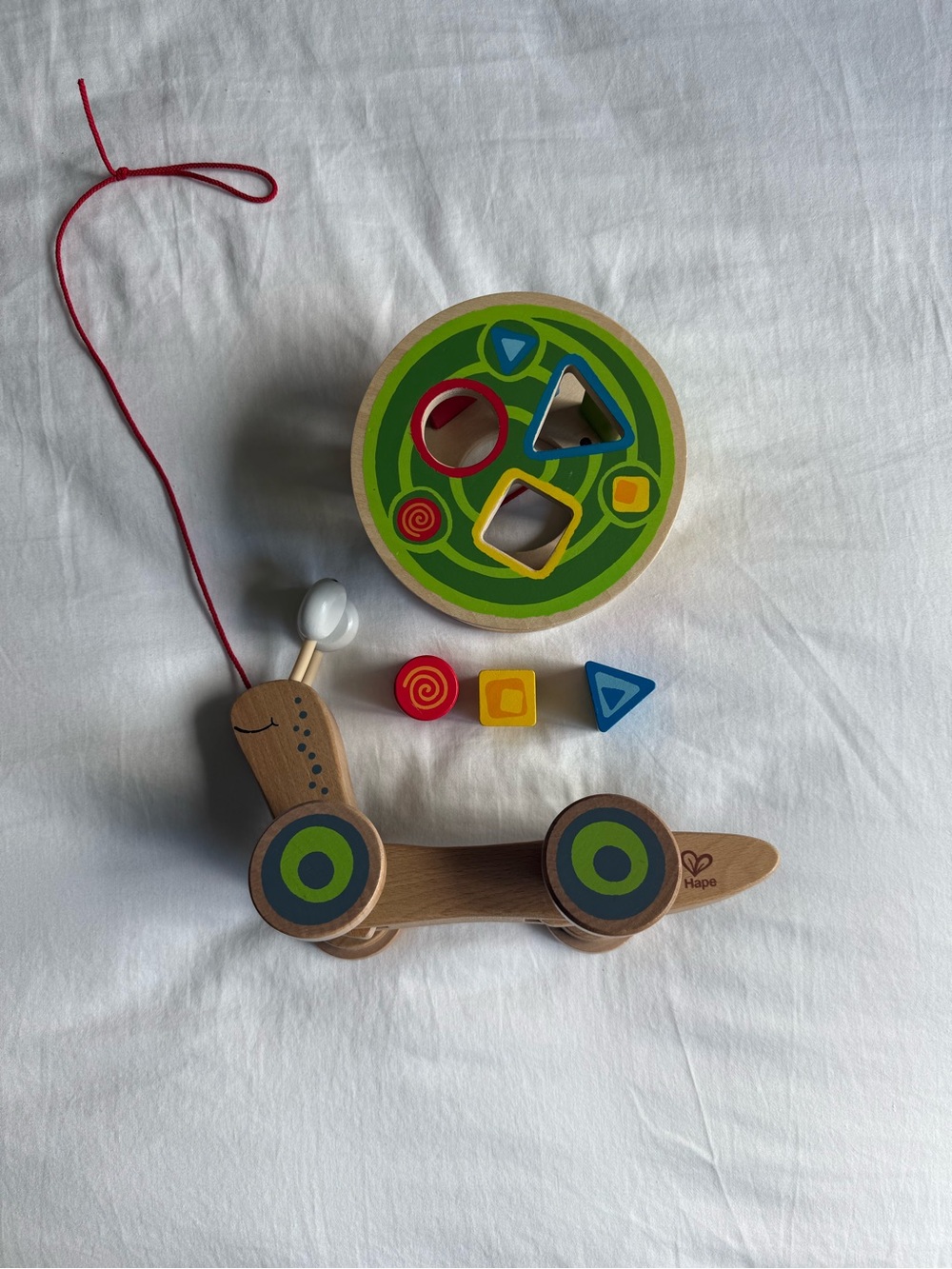 Hape Walk Along Snail and Shape Sorter